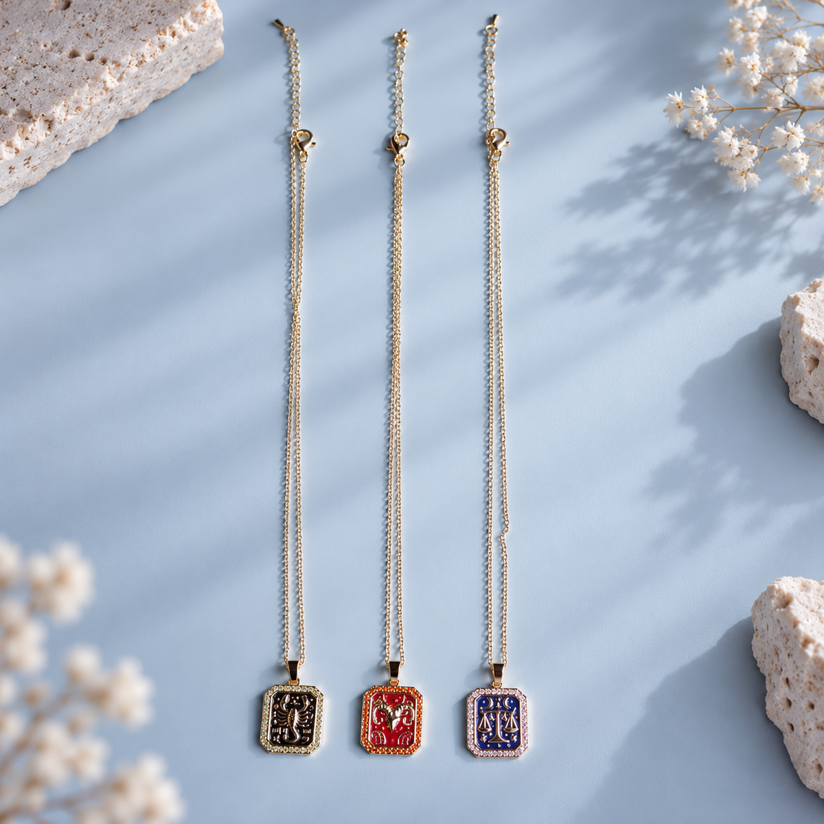 Three zodiac necklaces in a row
